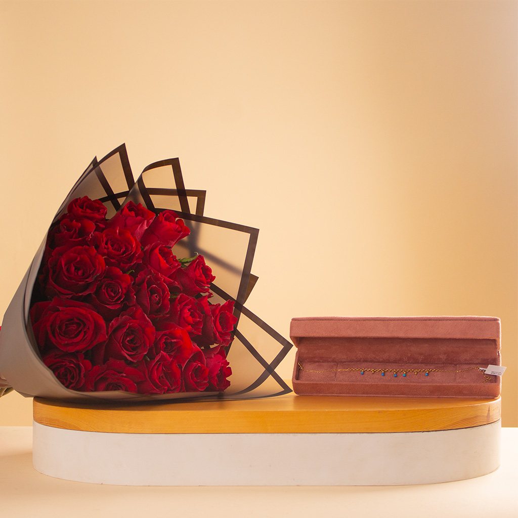 Flowrista Online Flowers Shop سوار سيران من الذهب عيار ١٨ قيراطًا وباقة من ٢٠ وردة حمراء