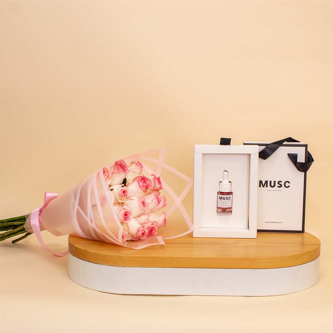 Flowrista Online Flowers Shop عطر زيتي بالرمان مسك 10 مل مع ورود وردية