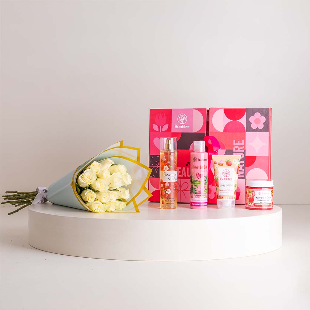 Flowrista Online Flowers Shop مجموعة العناية بالجسم بالفراولة من بابلز وباقة من الورود البيضاء