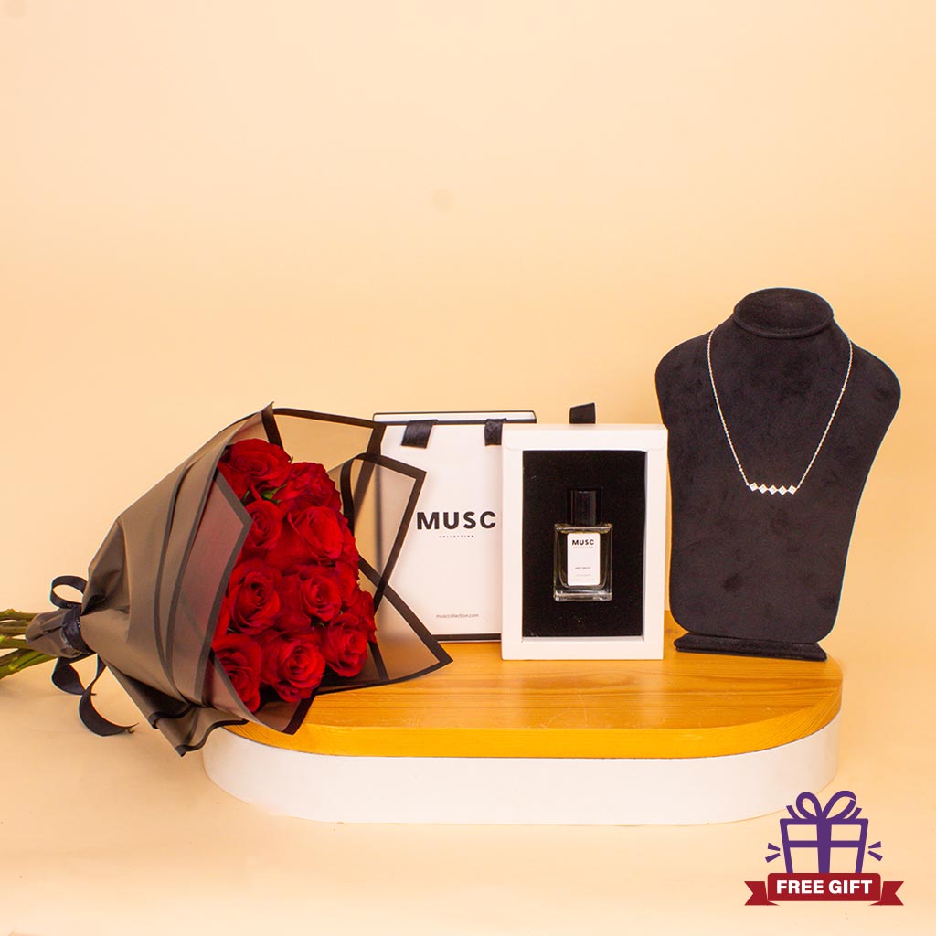 Flowrista Online Flowers Shop مجموعة سيجنتشر مسك وزركون - عطر 30 مل مع قلادة وباقة ورد أحمر