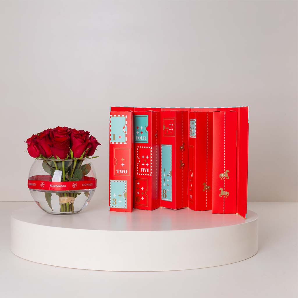 Flowrista Online Flowers Shop تقويم سول آند مور السحري للميلاد مع مزهرية ورود حمراء