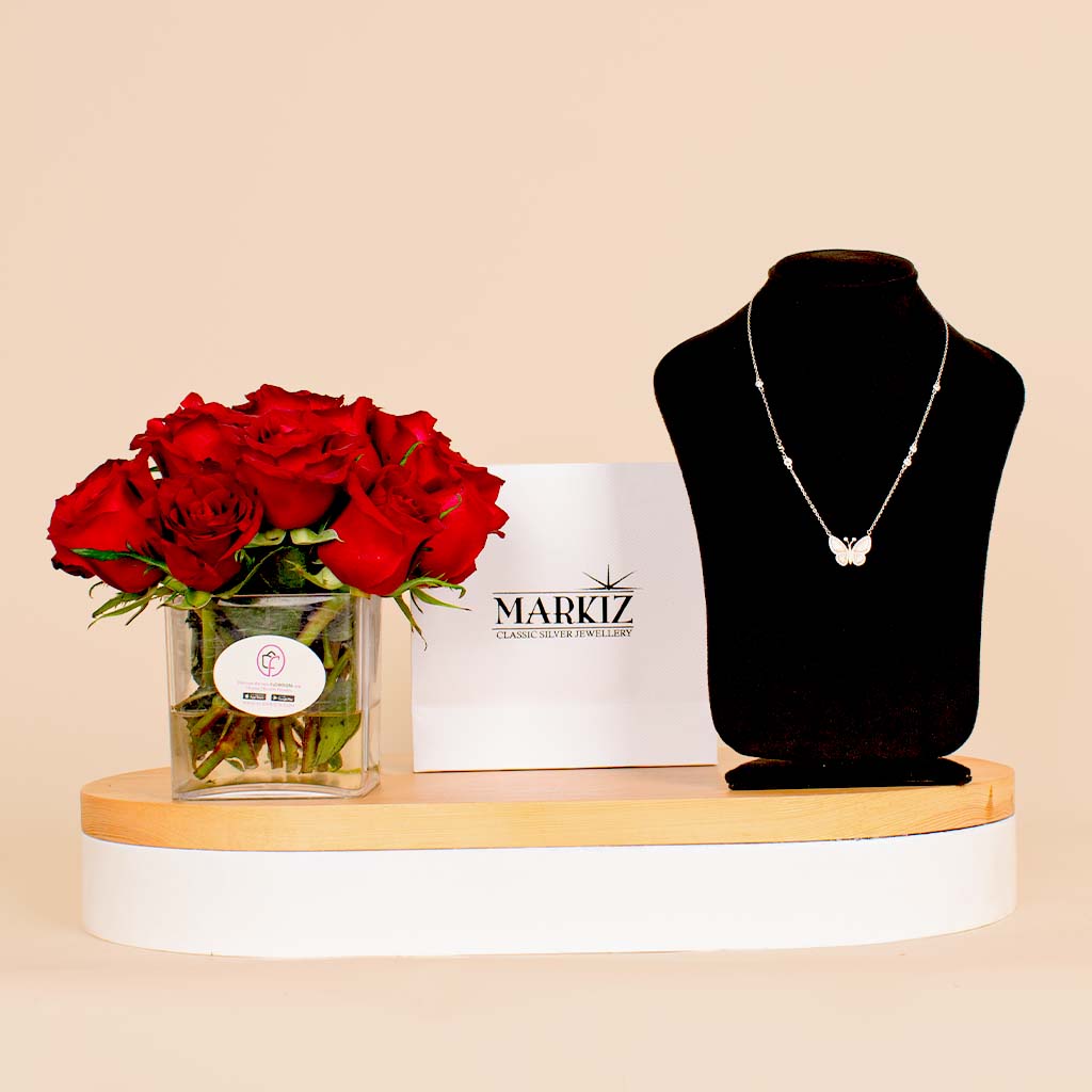 Flowrista Online Flowers Shop عقد ماركيز فراشة بينك مع مزهرية تحتوي على 15 وردة حمراء