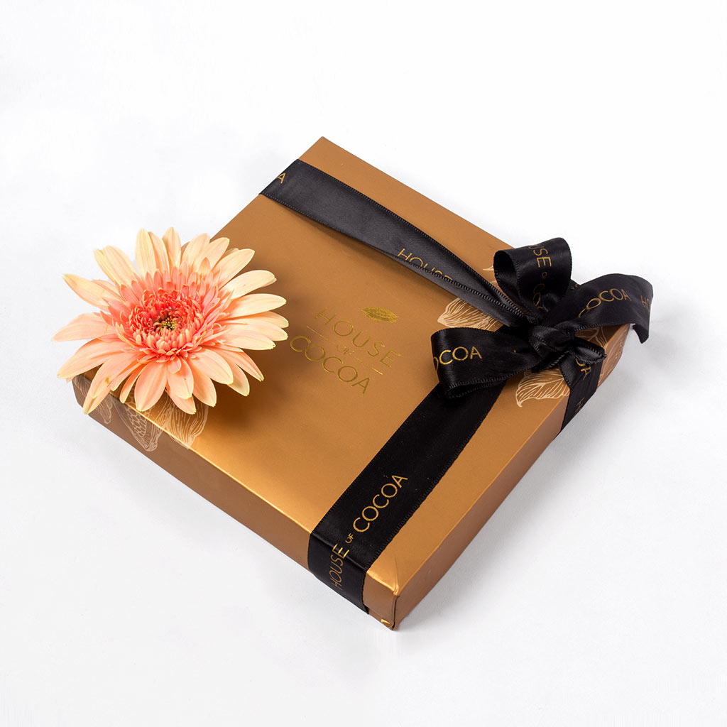 Flowrista Online Flowers Shop علبة شوكولاتة هاوس أوف كاكاو 16 قطعة وجربيرا